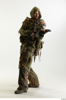 Photos John Hopkins Army Postapocalyptic Suit Poses aiming the gun…